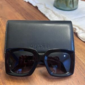 CHANEL Elegant Black Sunglasses with Case